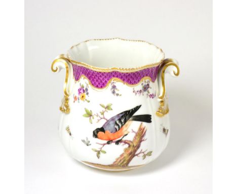 A Meissen style cache pot painted with birds below a puce scale border, 17cm high