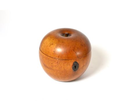 A fruitwood tea caddy in the form of an apple, 11cm high