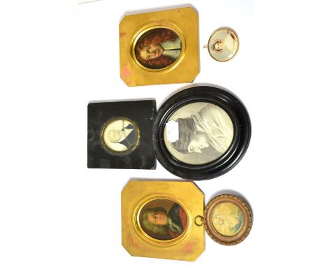 A pair of miniature portraits after J Hoppner, painted on ovals in gilded frames, bears paper label to verso, height 8.5cm; c