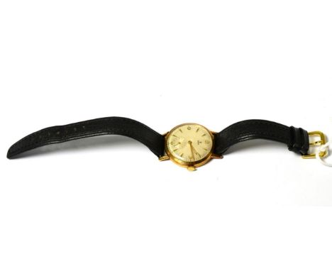 A 9ct gold wristwatch, signed Tudor, 1956, lever movement signed, engine turned silvered dial with dagger and Arabic numerals