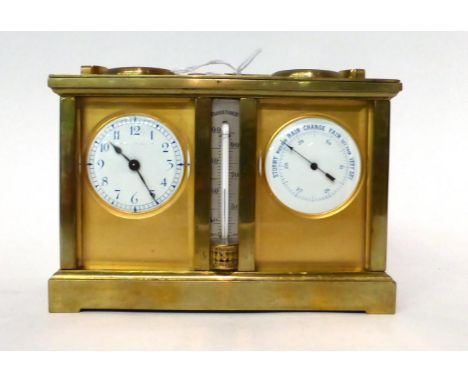 * A brass compendium desk timepiece, circa 1910, carrying handle, combined timepiece/compass/barometer/thermometer, single ba