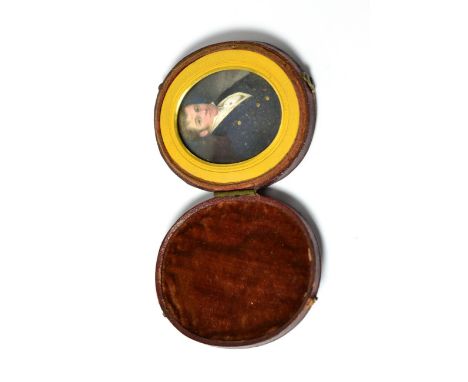 An early 19th century Continental oval portrait miniature on ivory, depicting a gentleman, half length, in a blue coat and wh