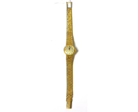 A lady's 9ct gold wristwatch, signed Tissot, model: Stylist, 1969, lever movement, silvered dial with baton markers, London h