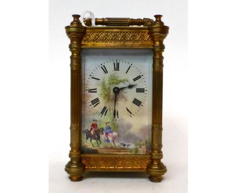 * A brass carriage timepiece, circa 1910, carrying handle, enamel dial with Roman numerals and depicting figures on horseback