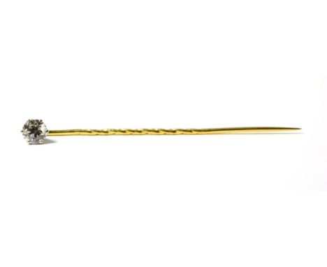 A diamond set tie pin, an old cut diamond in a white claw setting on a yellow pin with a midway twist, estimated diamond weig