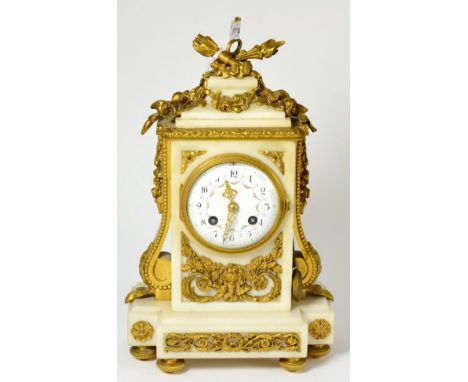 A marble and ormolu mounted striking mantel clock, circa 1890, floral and scroll mounts, enamel dial with Arabic numerals, tw