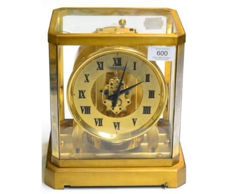 A brass atmos clock, signed Jaeger LeCoultre, retailed by Fattorini & Sons Ltd, Bradford, 20th century, 5-inch Roman chapter 