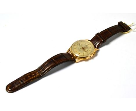 A chronograph wristwatch, signed Coresa, circa 1950, lever movement, silvered dial with dagger and Arabic numerals, two dials