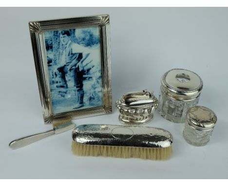 A collection of Silver items to include brushes , scent bottles,plated Ronson lighter and picture frame  (6)