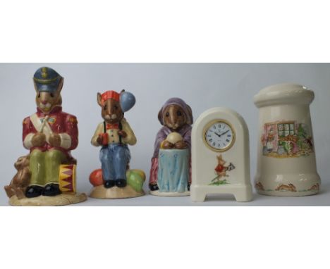 Royal Doulton Bunnykins items of a Desk Clock, A Pillar Money Box, Bunnykins Party time Toby Jug, Bunnykins Toy Soldier Toby 