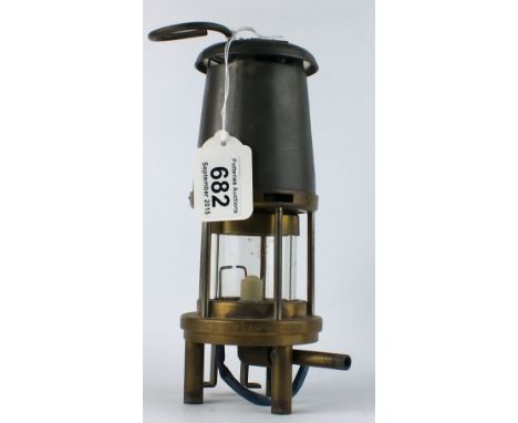The Wolf Miners Safety Lamp Co (Wm Maurice Ltd) Sheffield , table top Miners Safety Lamp with electric ignition stampedd Abbo