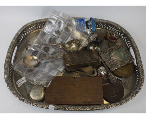 A collection of items to include Silver spoons, belt buckle, old coins, scales, medals, jewellery , silver plated gallery tra