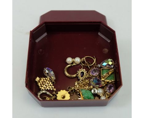 A collection of various gold earnings including Jade, Amethyst, pearls etc