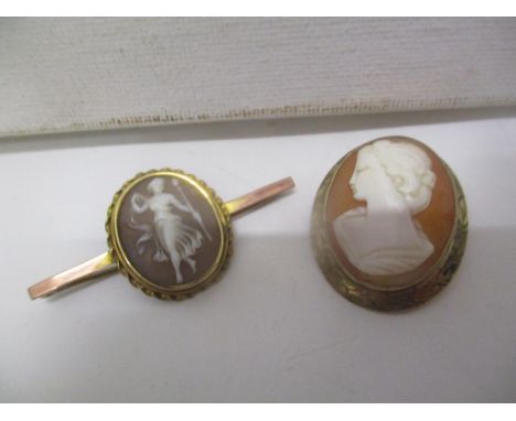 Two 9ct gold framed carved cameos, one on oval brooch the other a stick brooch, 10.45g total