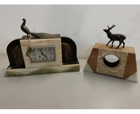 An Art Deco slate, alabaster and onyx mantel clock with spelter peacock finial together with one other lacking movementLocati