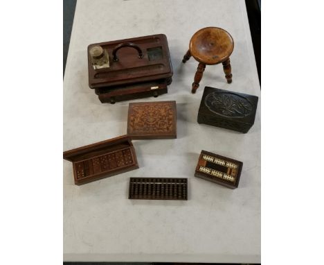 Treen and wooden items to include a mahogany ink stand by Army and Navy C.S.L, cased set of brass inlaid dominoes, two musica