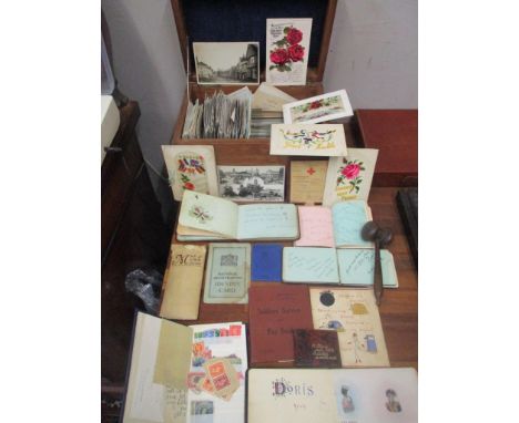 A mixed lot to include early 20th century and later postcards housed in a wooden box to include embroidered World War cards f