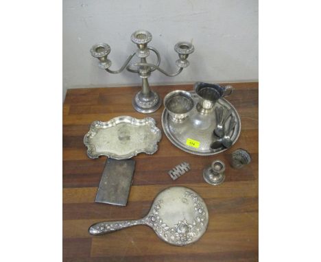 A mixed lot of silver and silver plate to include an Edwardian silver clad dressing table hand mirror decorated with a rose s