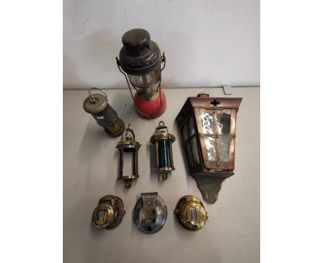 Vintage lighting to include a brass ships lamp marked S and A A P16042, Wolf safety lamp, Powell and Hanmer Lamp, a copper wa