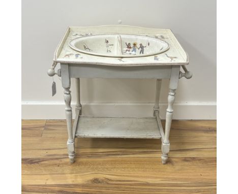 A French Sarreguemines pottery child's basin decorated with nursery scenes and matching wash stand, 51 x 37 x 48cm