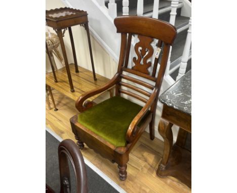 A Victorian mahogany commode elbow chair, width 55cm, depth 50cm, height 109cm