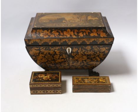 A Regency penwork tea caddy, the cover inset with an engraving of figures by a castle, 23.5 x 16 x 16cm and two small Tunbrid