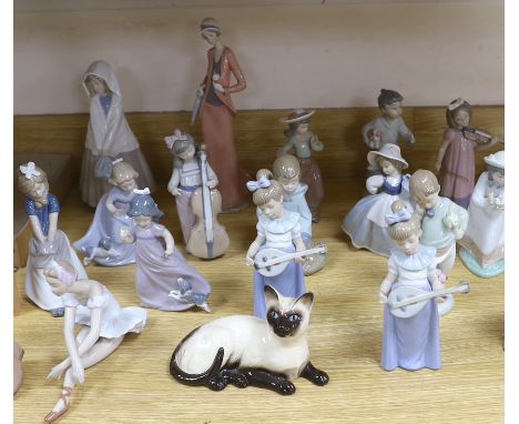 Seventeen Nao models, a Lladro ballerina and a Beswick cat (19)