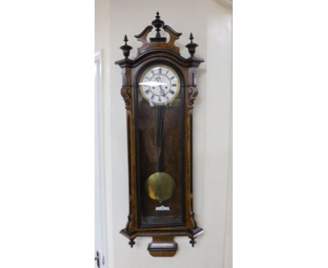A 19th century Vienna regulator wall clock, 113cm high Case one minor chip to one ebonised finial; otherwise case and dial go