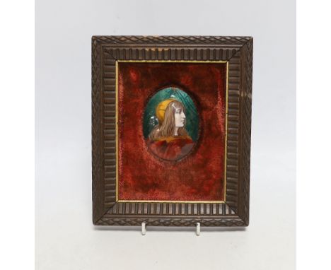 A Limoges oval enamelled plaque of a medieval girl, signed to the reverse, E. Blanchez, framed, overall 21 x 17cmSome losses 