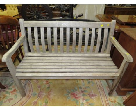 A HARDWOOD GARDEN BENCH