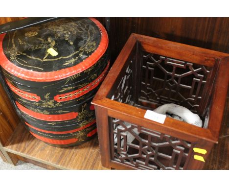 A DECORATIVE ORIENTAL STYLE PLANTER TOGETHER WITH A LACQUERWARE SWING BOX WITH CONTENTS