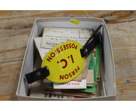 A QUANTITY OF VINTAGE RAILWAY EPHEMERA TO INCLUDE WAGON LABELS, ENAMEL ARM BAND ETC