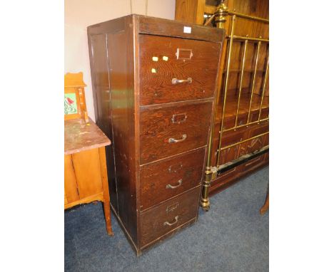 A VINTAGE WOODEN FOUR DRAWER FILING CHEST