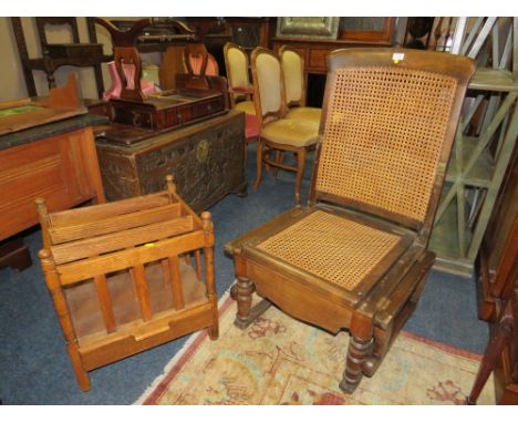 A VINTAGE COMMODE ARMCHAIR, AN OAK MAGAZINE RACK AND A DUMB WAITER (3)
