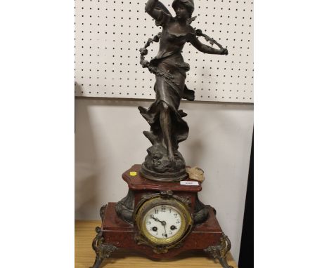 A FIGURAL FRENCH MARBLE MANTLE CLOCK WITH GILT EMBELLISHMENTS