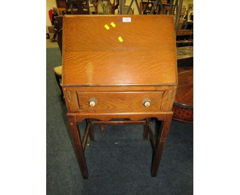 A SMALL VINTAGE OAK BUREAU AND TWO CHAIRS (3)