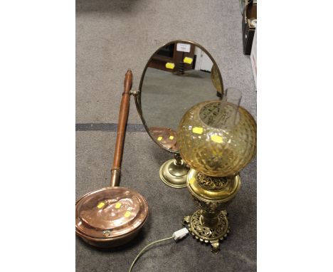 A BRASS VANITY MIRROR TOGETHER WITH A DECORATIVE BRASS OIL LAMP AND COPPER BED WARMING PAN