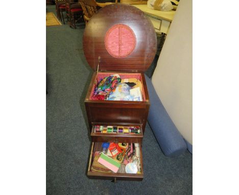 A VINTAGE SEWING  BOX / TABLE WITH CONTENTS