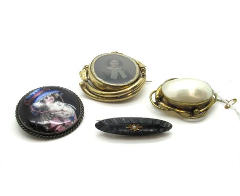 A Victorian "Pinchbeck" Mourning Brooch with Swivel Photo Locket, containing Victorian photographic images; Together with A B
