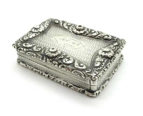 A Hallmarked Silver Vinaigrette, John Bettridge, Birmingham 1828, of rectangular form, allover engine turned with raised flow