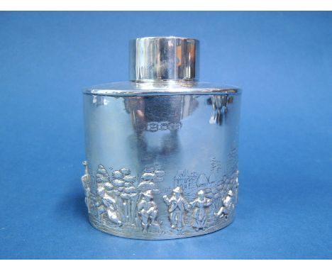 A Hallmarked Silver Caddy, (marks rubbed) of oval form, detailed in relief with rural villagers scene, base 8.2cm wide.