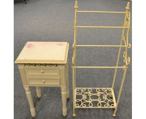 A Cream Painted Two Drawer Bedside Chest of recent date, raised on turned legs, 40cm by 32cm by 71cm; and A Painted Wrought I