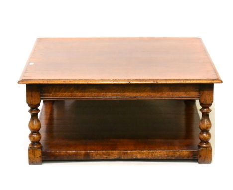 A Titchmarsh & Goodwin Oak Coffee Table with Drawer, model RL22054/ETM, of square form, raised on spindle turned legs with bl