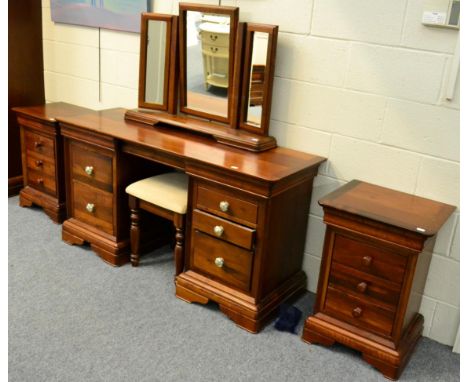 A Reproduction Mahogany Bedroom Suite by Willis & Gambier, comprising: a 6' sleigh bed, a pair of three drawer bedside chests