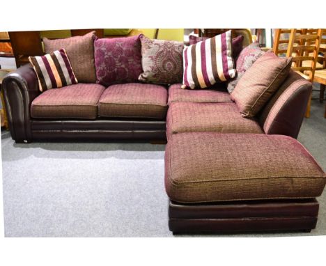 A Leather and Red Fabric Four-Seater Corner Sofa, with scatter cushions, maximum width 260cm; and A Matching Footstool (2)