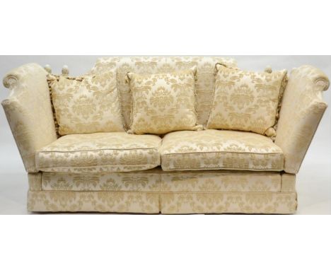 A Modern Three-Seater Knole Style Sofa, upholstered in cream fleur de lys style fabric, with drop ends and three scatter cush