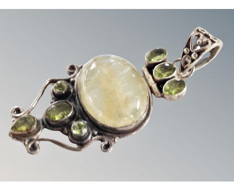 A large silver pendant 