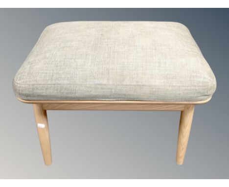 An Ercol elm footstool 