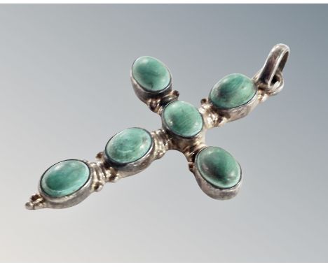 An old silver turquoise cross