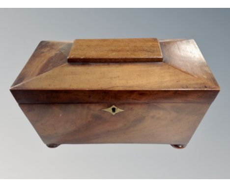 A Regency mahogany sarcophagus tea caddy 